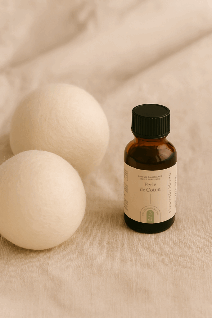 Boules de séchage en laine avec huile parfumée dans un sèche-linge
